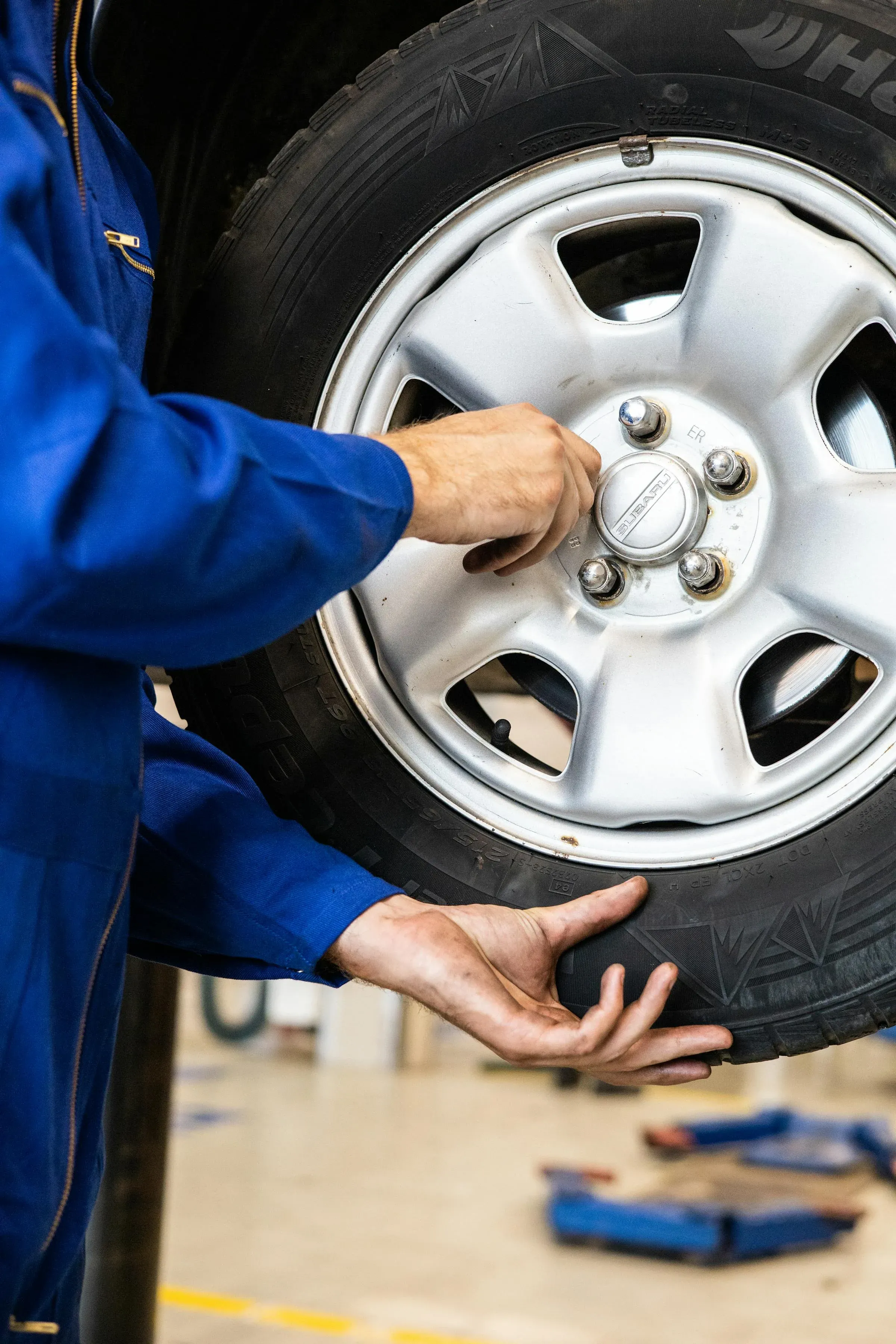 Roadside tire change being performed by a Safelane technician